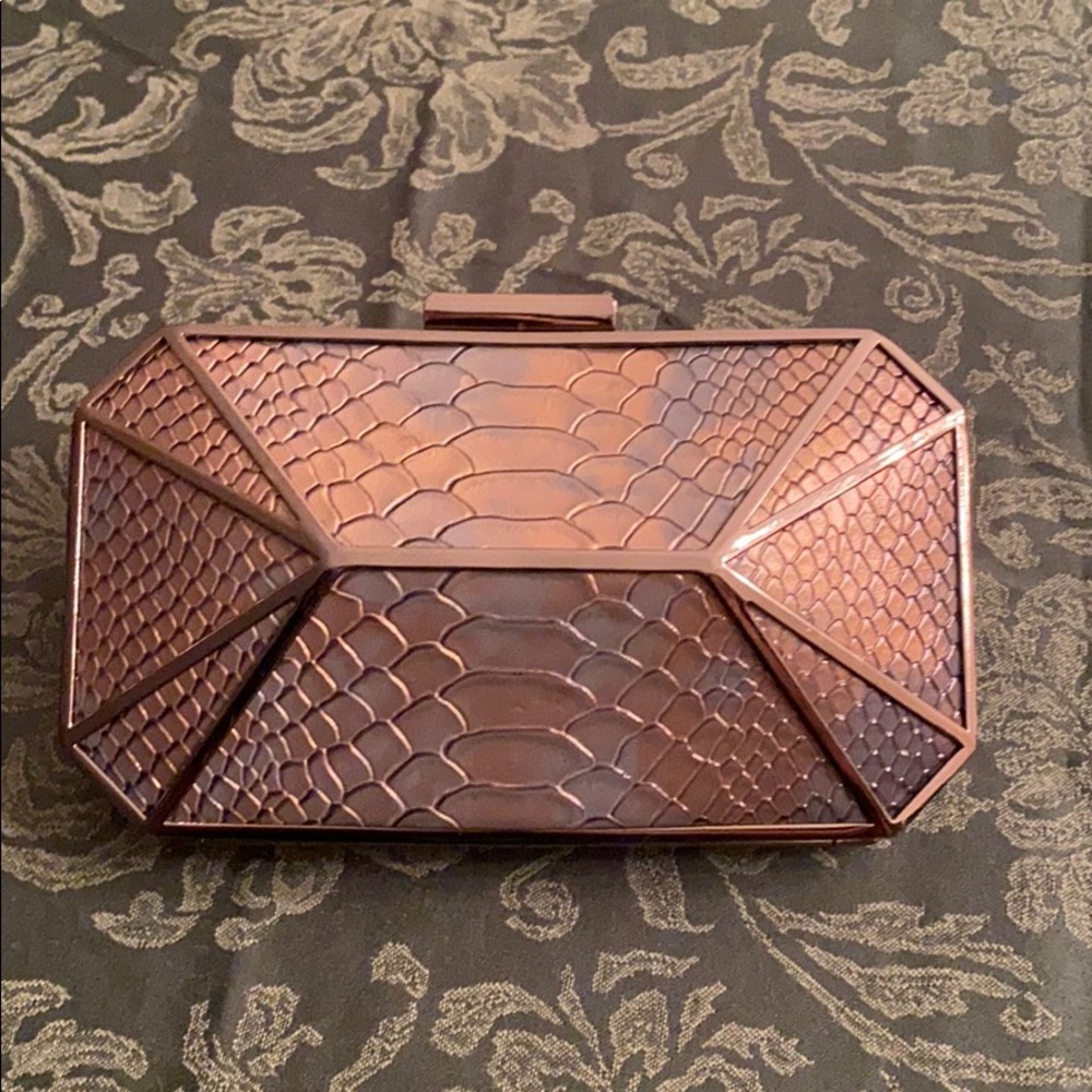 Gunmetal snake print clutch